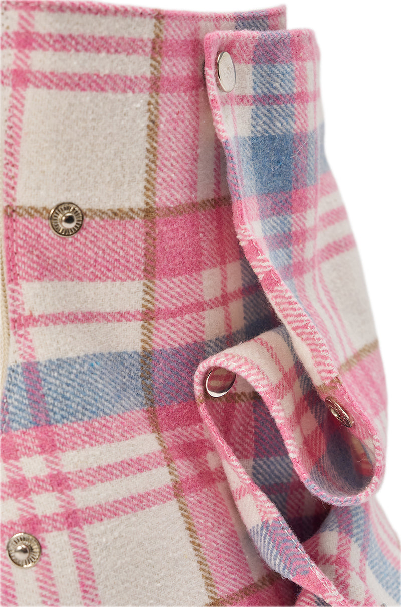 Close-up of a pink, blue, and beige plaid flannel shirt with metal snap buttons, perfectly complementing the AZALEA WANG BIRD SONG PINK PLAID MULTI OPEN TOE SNAP BOOTIE.