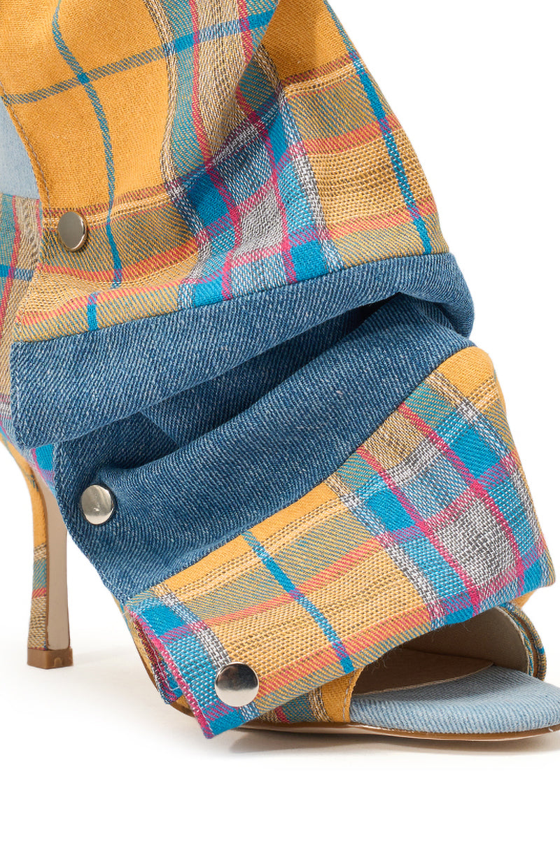 The AZALEA WANG BIRDSONG YELLOW PLAID SNAP BOOTIE features an open toe and stiletto heel, with yellow, blue, and pink plaid fabric, denim details, and silver snap buttons for a bold layered look at the ankle and toes. 5