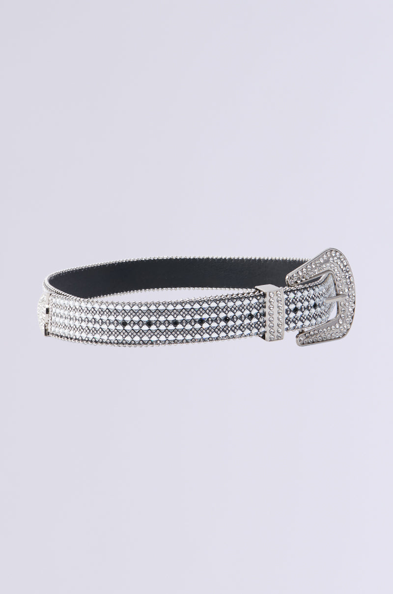 The BLING BABE WESTERN BELT is a sparkling Western accessory with a silver, rhinestone-studded design and a decorative, rhinestone-encrusted buckle against a plain light gray background.