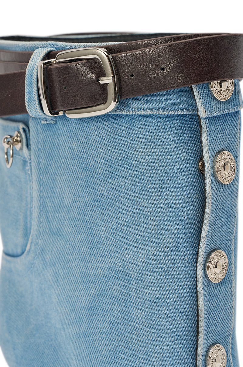 Close-up of light blue denim with silver buttons and a dark brown leather belt with a silver buckle, paired with the AKIRA GOLD BLEILIC DENIM WEDGE OPEN TOE BOOTIE for bold streetwear style. 6