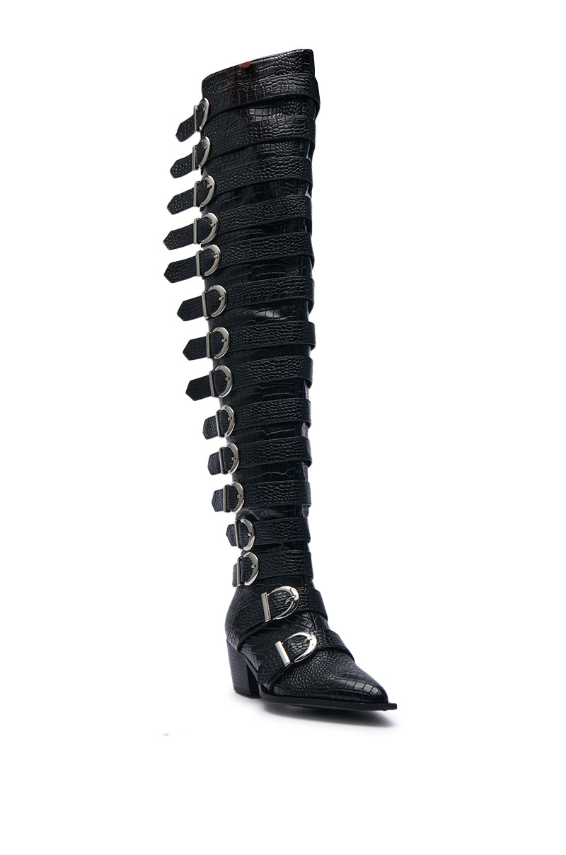 The AZALEA WANG BRAULIA BLACK CROC WESTERN BOOT is a black boot with faux crocodile leather, multiple straps, silver buckles, and a pointed toe design.