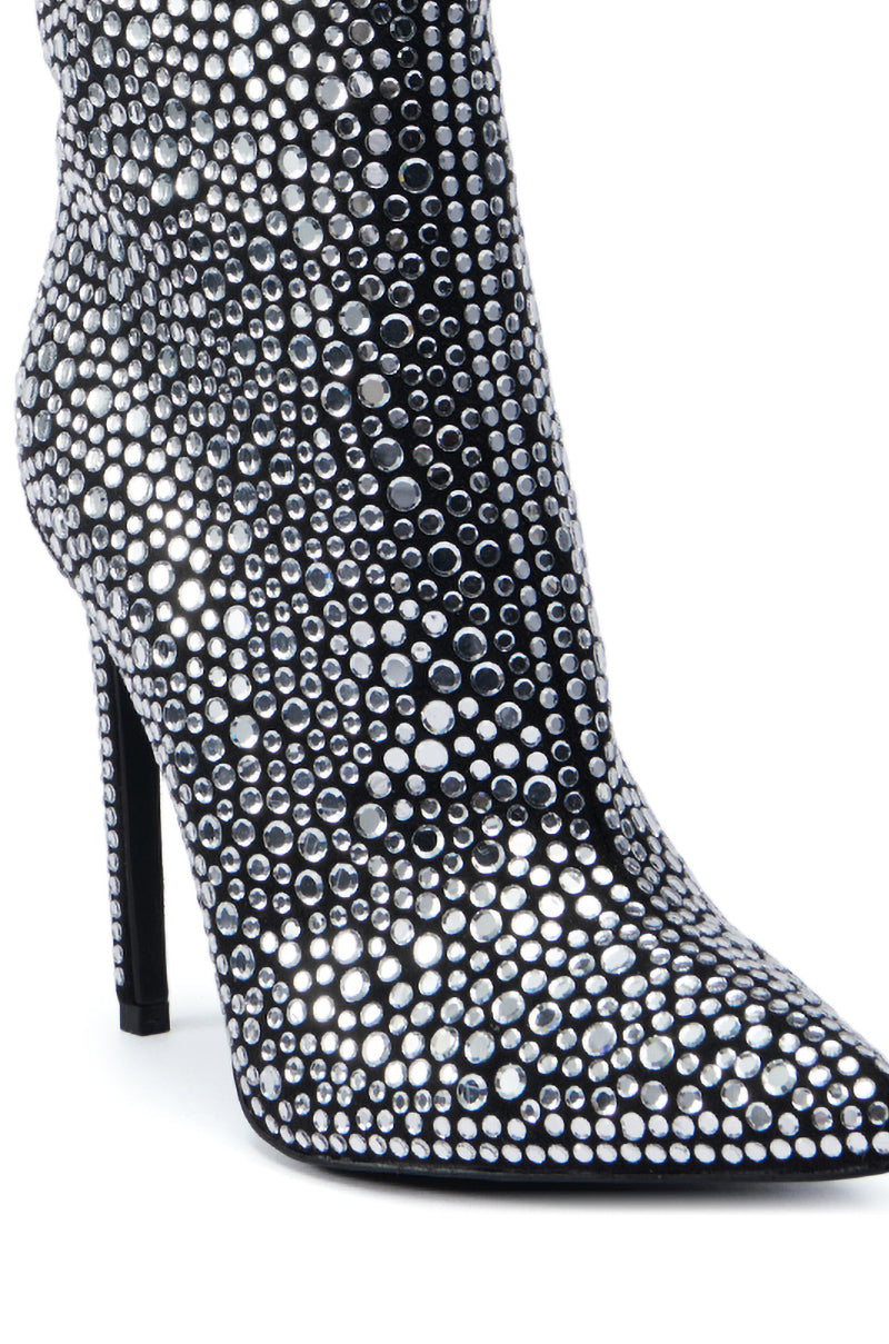 A close-up of the AZALEA WANG BRAULIO Black Stiletto Bootie, adorned with shimmering rhinestone embellishments and featuring a pointed toe and sleek, elegant design.