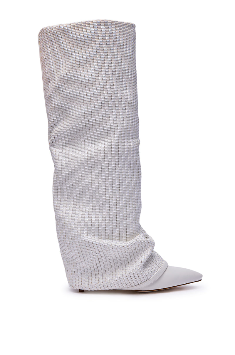 The AZALEA WANG BRETANGE WOVEN PU FOLD OVER BOOT IN WHITE is a single knee-high boot with a pointed toe, flat sole, and loose slouchy shaft featuring a subtle square grid pattern for an oversized modern look. 5