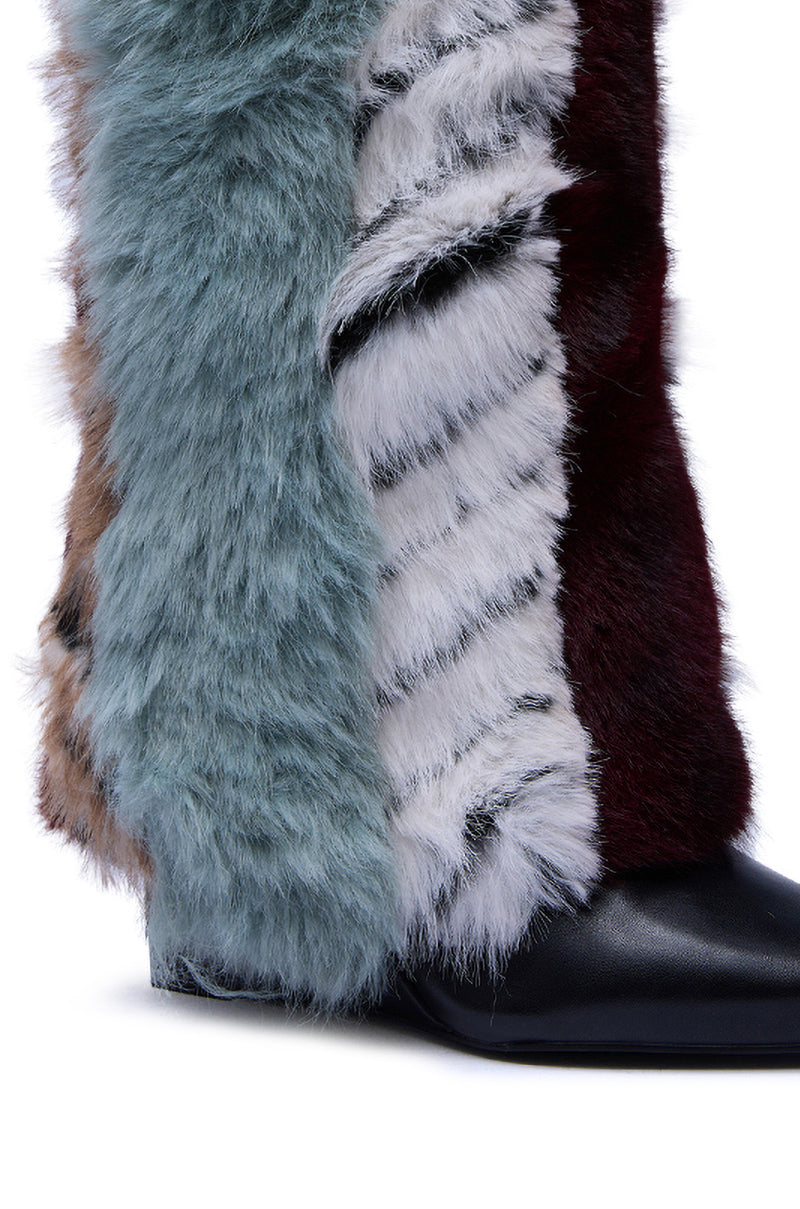 A close-up of the AZALEA WANG BRIASH BLUE MULTI FUR HIDDEN WEDGE BOOTIE featuring teal, white, brown, and burgundy faux fur panels with a pointed black leather toe.