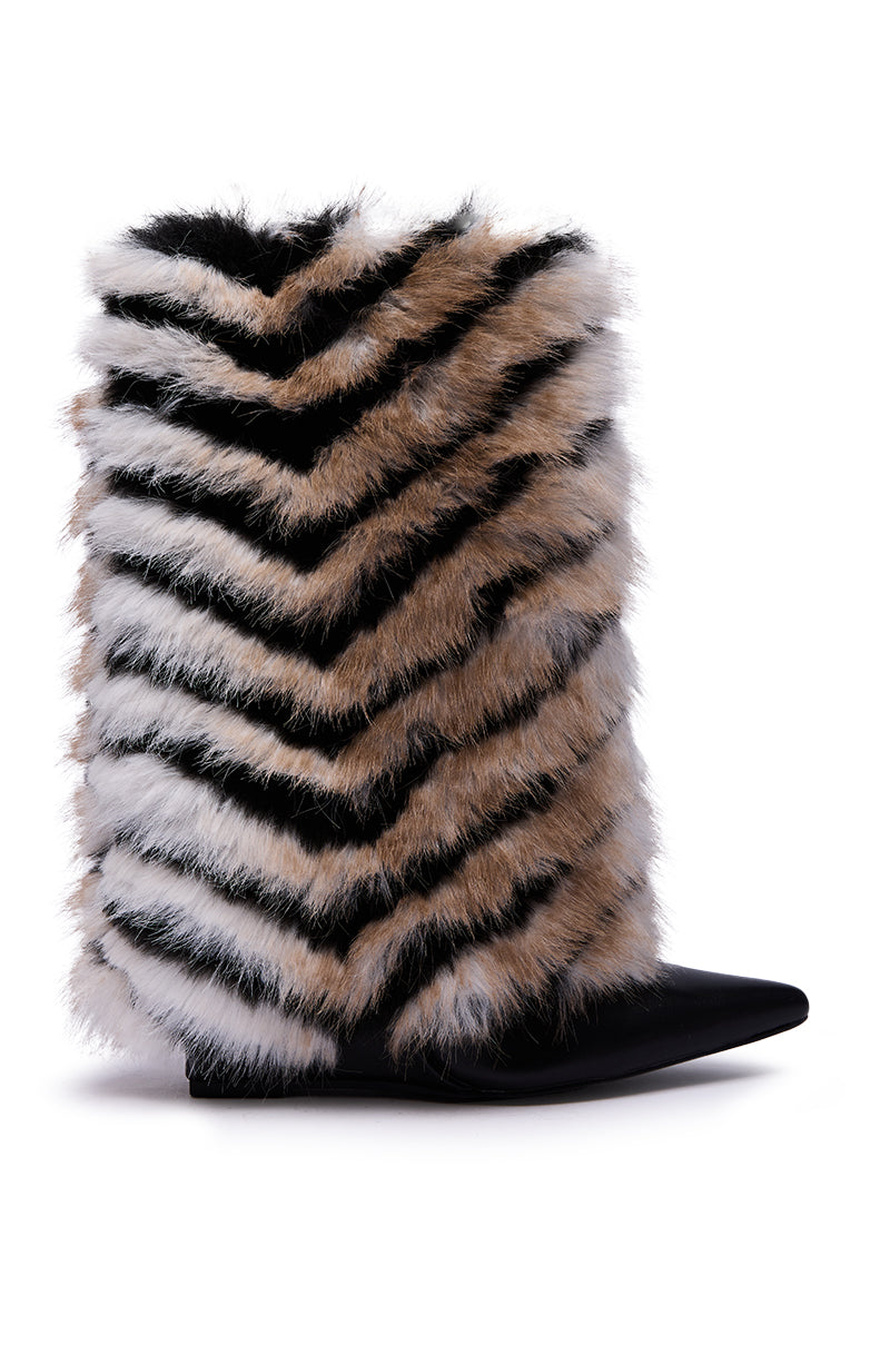 The AZALEA WANG BRIENNE BLACK FUR HIDDEN WEDGE BOOTIE features a pointed toe, faux leather design, and a high shaft wrapped in fluffy black, white, and brown chevron-striped faux fur.