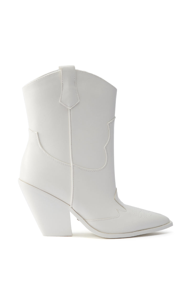 The AZALEA WANG BRIGGITTA WHITE WESTERN COWBOY BOOTIE features a mid-calf silhouette, pointed toe, decorative stitching, chunky angled heel, and faux leather finish, displayed in side profile on a white background.