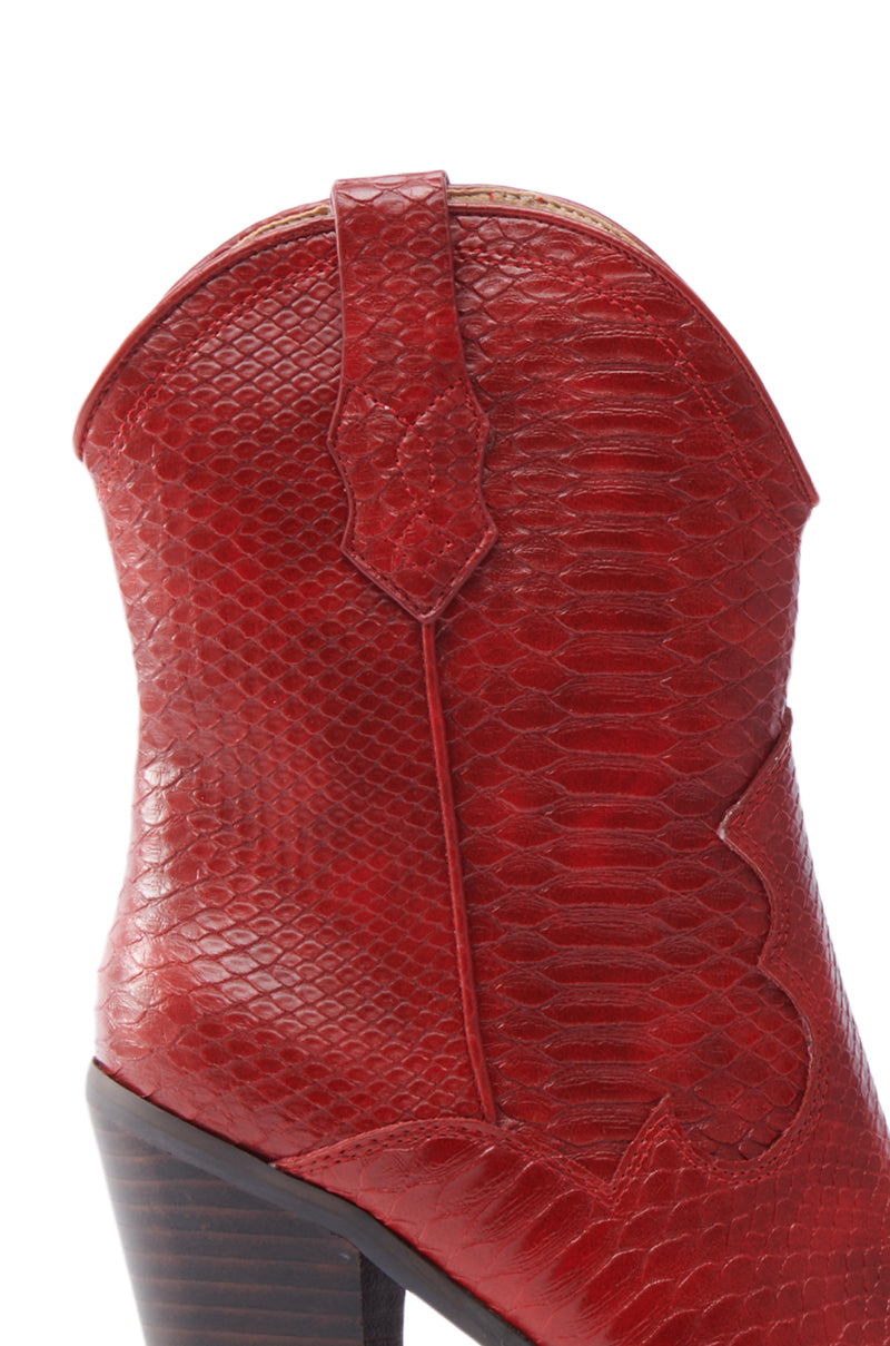 Close-up of the BROOKLYN RED WESTERN COWBOY BOOTIE showcasing a bold snakeskin pattern, decorative stitching, and a wooden heel. 6