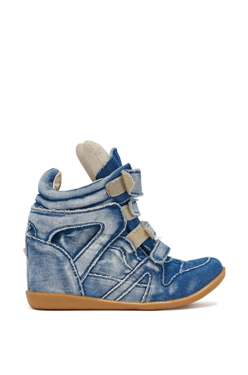 The AZALEA WANG BRYANT DENIM WEDGE SNEAKER features a blue denim upper, beige accents, velcro straps, and a light brown rubber sole—an ideal high-top for elevating your streetwear collection. 3