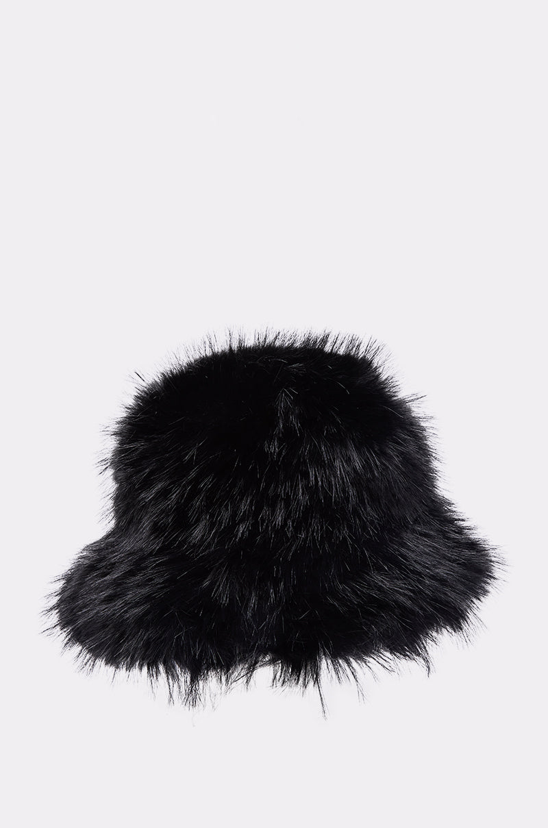 The CHIC FAUX FUR BUCKET HAT in black features a soft, fluffy texture, ideal for winter wear, and is shown against a plain white background. 2