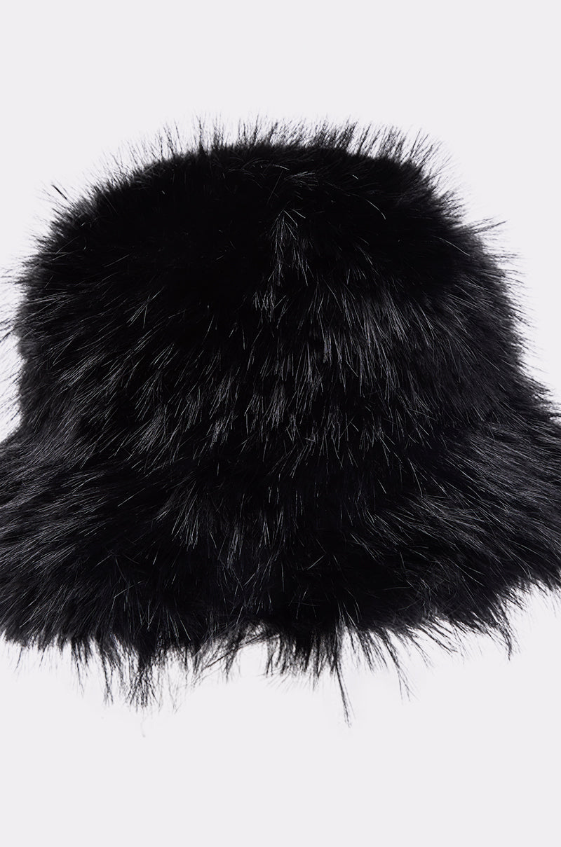 The CHIC FAUX FUR BUCKET HAT, crafted from black faux fur with a soft, fluffy texture, is displayed against a light background—ideal for cozy winter wear. 3