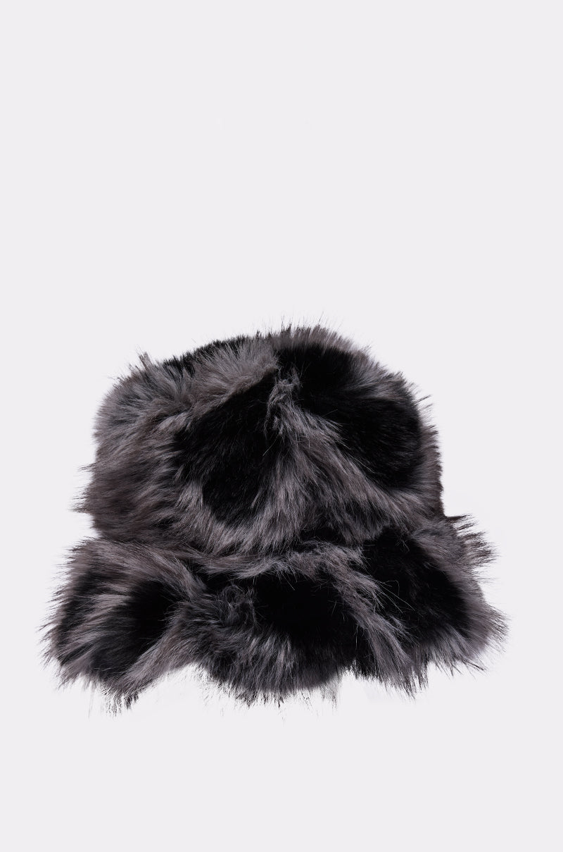 The ARLO FAUX FUR BUCKET HAT from AKIRA Label features soft black and dark gray faux fur, shown against a plain white background—a stylish and cozy winter accessory.