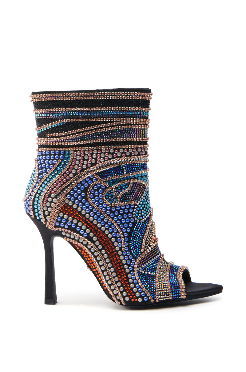 The AZALEA WANG BYRE BLACK EMBELLISHED RHINESTONE OPEN TOE BOOTIE is a stiletto adorned with intricate, multicolored beadwork in swirling patterns, featuring shades of blue, orange, purple, and brown on a black base.