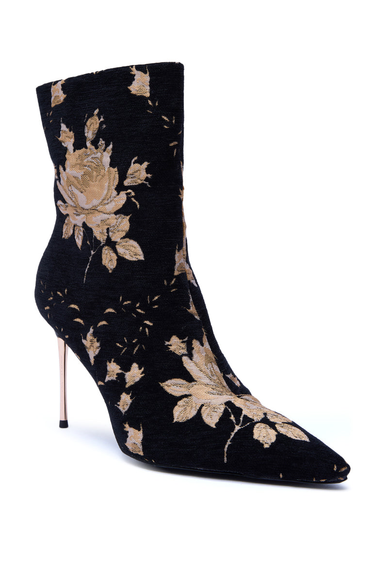 The AZALEA WANG CALEAN BLACK MULTI BROCADE STILETTO BOOTIE features a pointed toe and elegant black brocade, embellished with an intricate gold floral pattern for added sophistication. 4