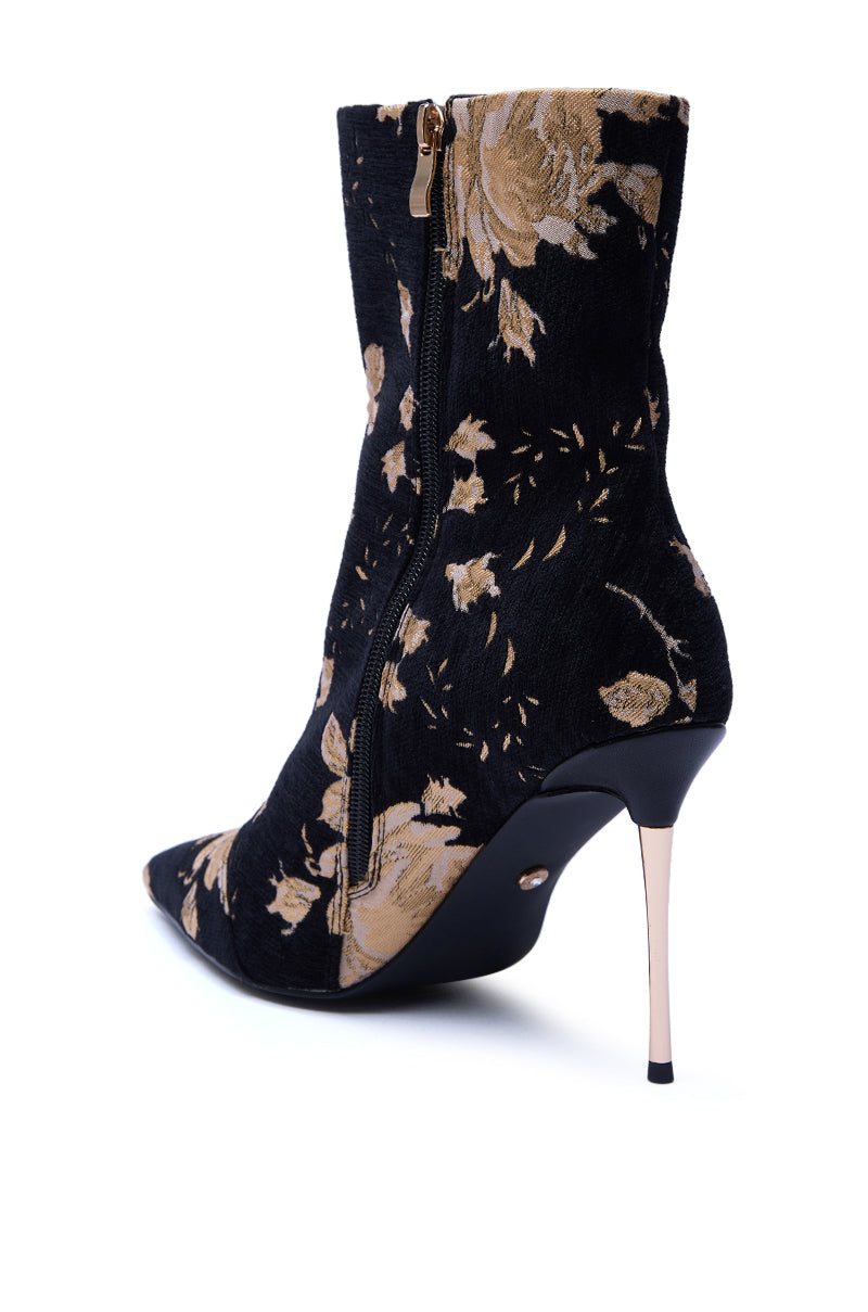 The AZALEA WANG CALEAN BLACK MULTI BROCADE STILETTO BOOTIE features tan floral patterns, a pointed toe, side zipper, and high stiletto heel for an elegant, standout look. 5