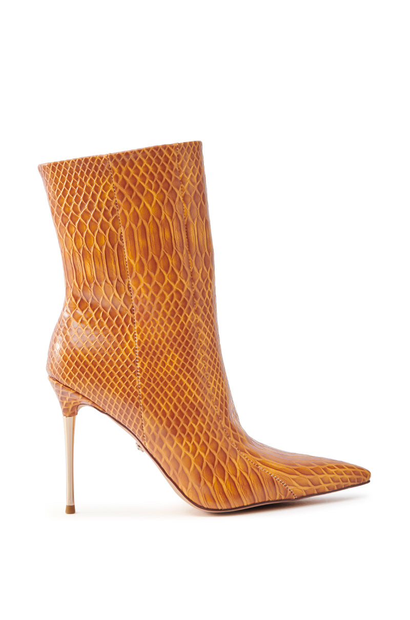 The AZALEA WANG CALEAN ORANGE STILETTO BOOTIE is a stylish bootie in vibrant orange with a faux leather snakeskin pattern, sharp pointed toe, and slender high heel.