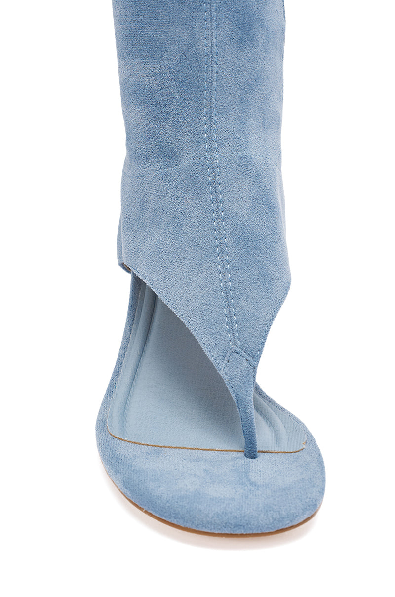 AZALEA WANG CECILE LIGHT BLUE FAUX SUEDE SANDAL features an open toe with a unique cutout highlighting the big toe, flat sole, and visible stitching. 5