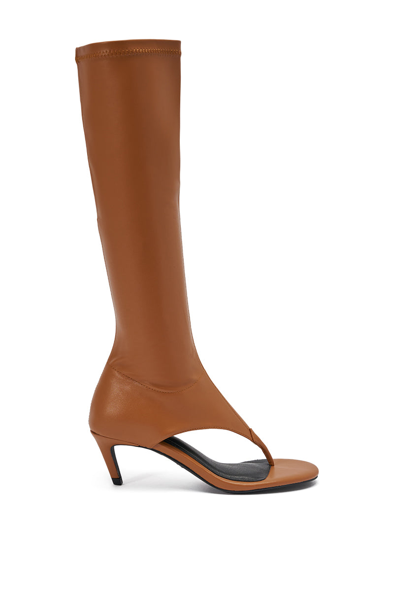 The AZALEA WANG CECILE TAN PU SANDAL is a modern knee-high, brown sandal with an open toe, thong design, and mid-height stiletto heel. 3