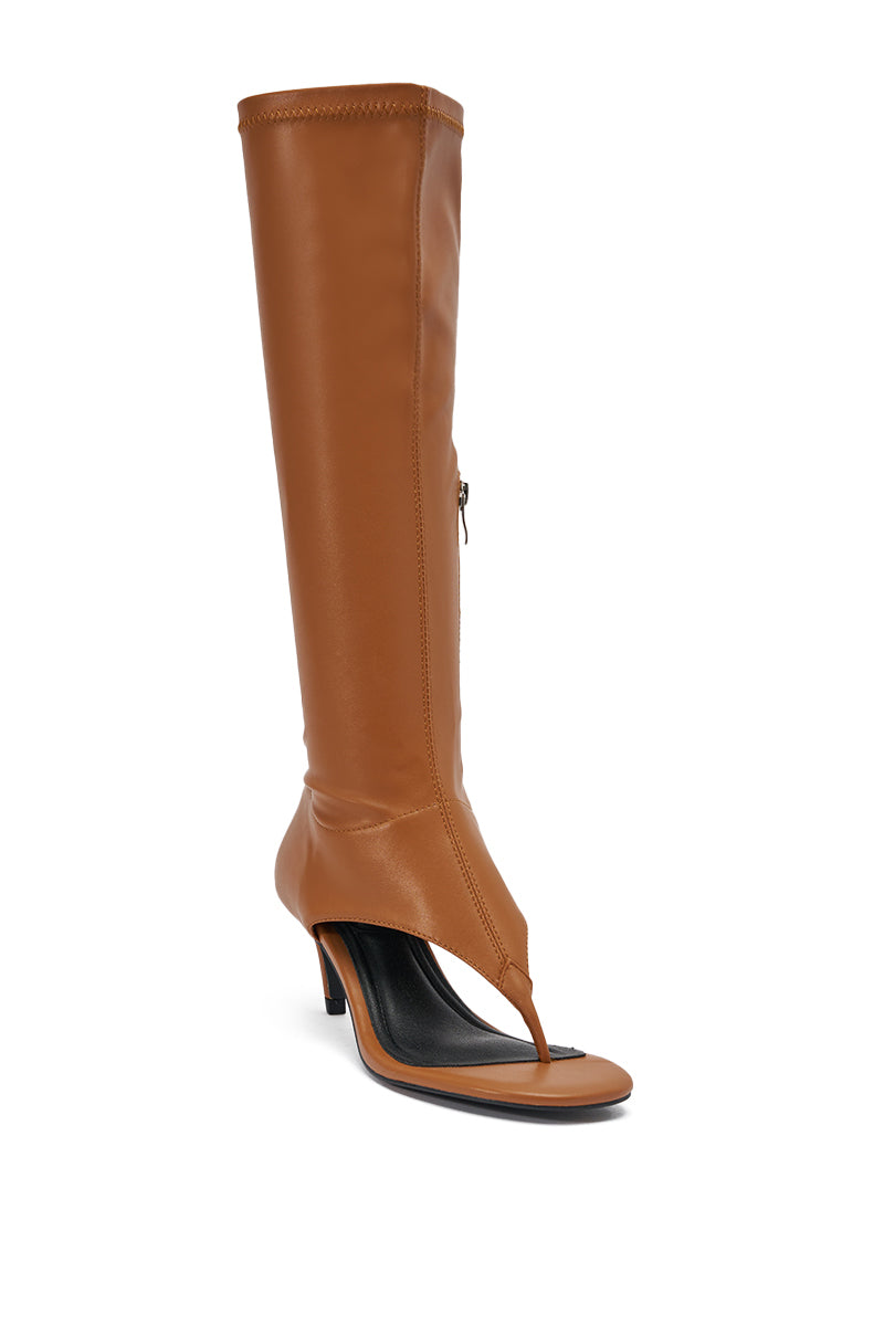 The AZALEA WANG CECILE TAN PU SANDAL is a knee-high, tan PU sandal with a thong-style open toe, sleek stiletto heel, and an inner side zipper for easy wear. 4