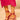 A person stands on a neutral background wearing a ruched bright pink skirt and the AZALEA WANG CELESIA FUCHSIA STILETTO SANDAL in metallic faux leather with comfort cushion insoles and metallic tips.