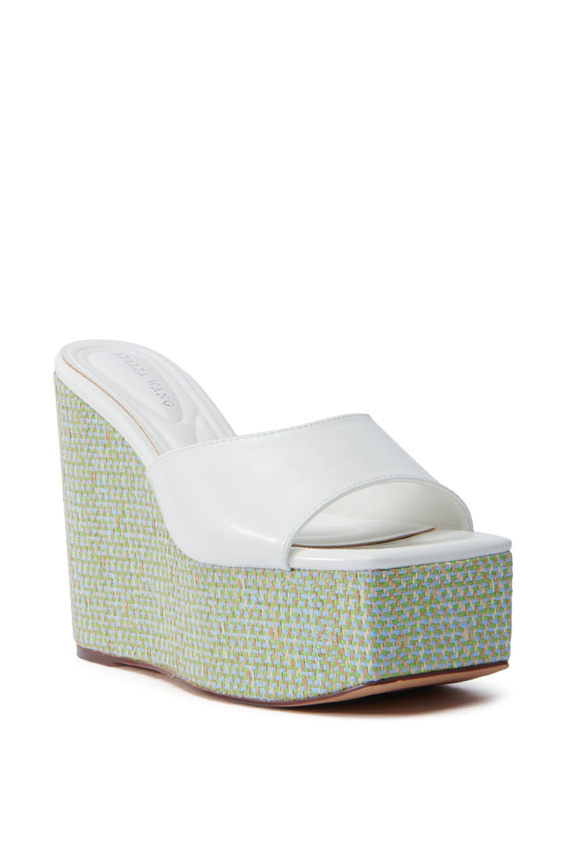 The AZALEA WANG CHANDRIA WHITE TWEED WEDGE SANDAL features a glossy upper strap, open square toe design, and a platform wedge with a textured woven look in blue and green. The smooth insole complements the strap for a cohesive finish. 4