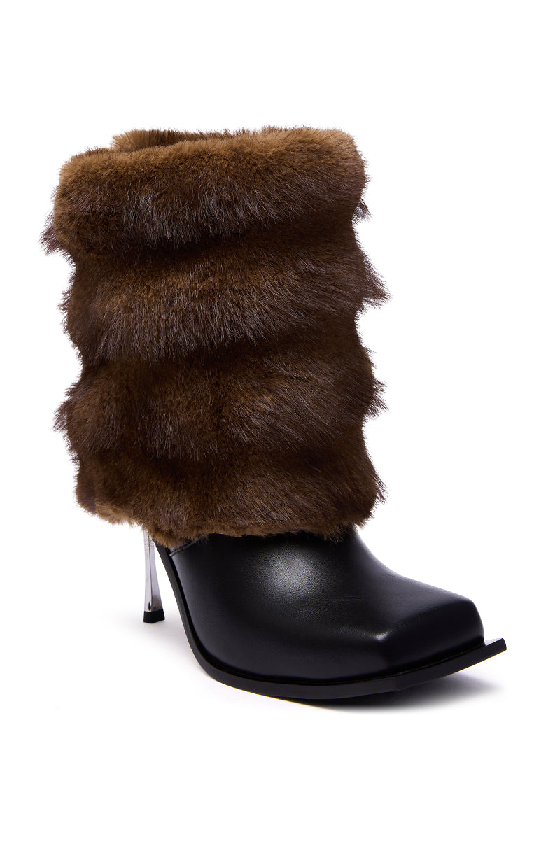 The AZALEA WANG CHINMAYI BROWN FUR CUFF SQUARE TOE STILETTO BOOTIE features a high metallic heel, supple black faux leather, a square toe silhouette, and a thick layered brown fur cuff for an elegant touch.