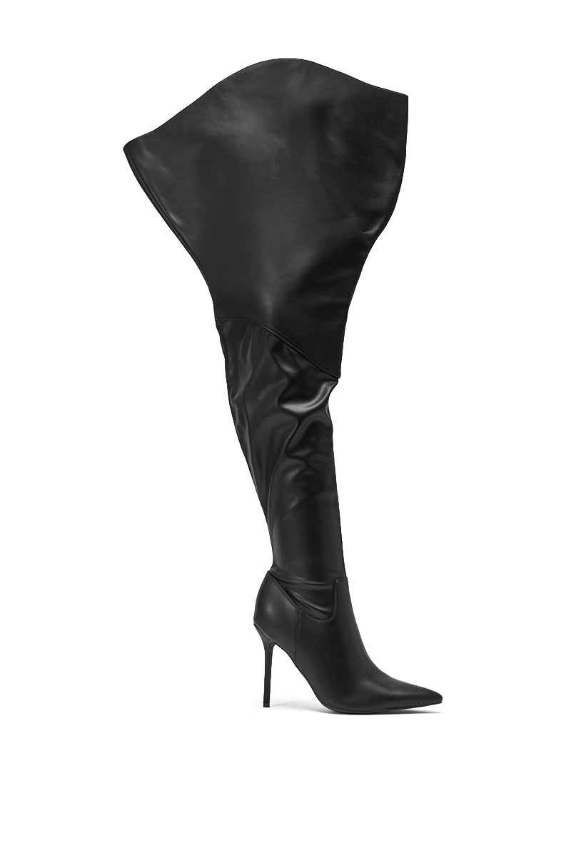 The AKIRA GOLD CHROMEA BLACK THIGH HIGH STILETTO BOOT features a pointed toe, black finish, and an exaggerated oversized cuff folding outward at the top, shown on a white background. 2