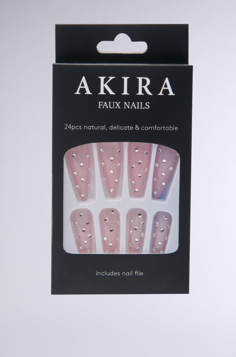 A black box labeled "GIRLY VIBES FALSE NAILS" displays almond-shaped pink false nails with silver gemstone accents, visible through a clear window. The package includes 24 pieces and a nail file.