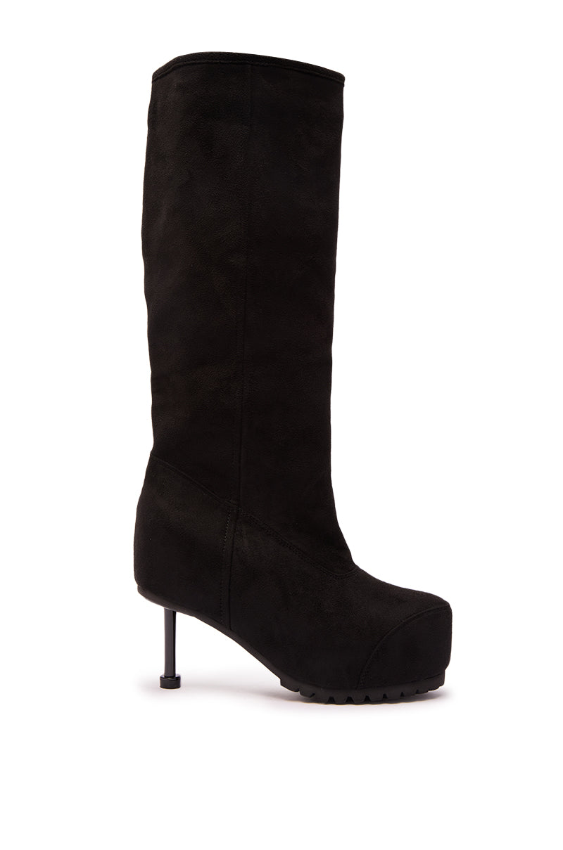 The AZALEA WANG CLEDQYN BLACK FAUX SUEDE BOOT is a knee-high boot with a chunky platform sole and slim stiletto heel, shown in side profile against a white background.
