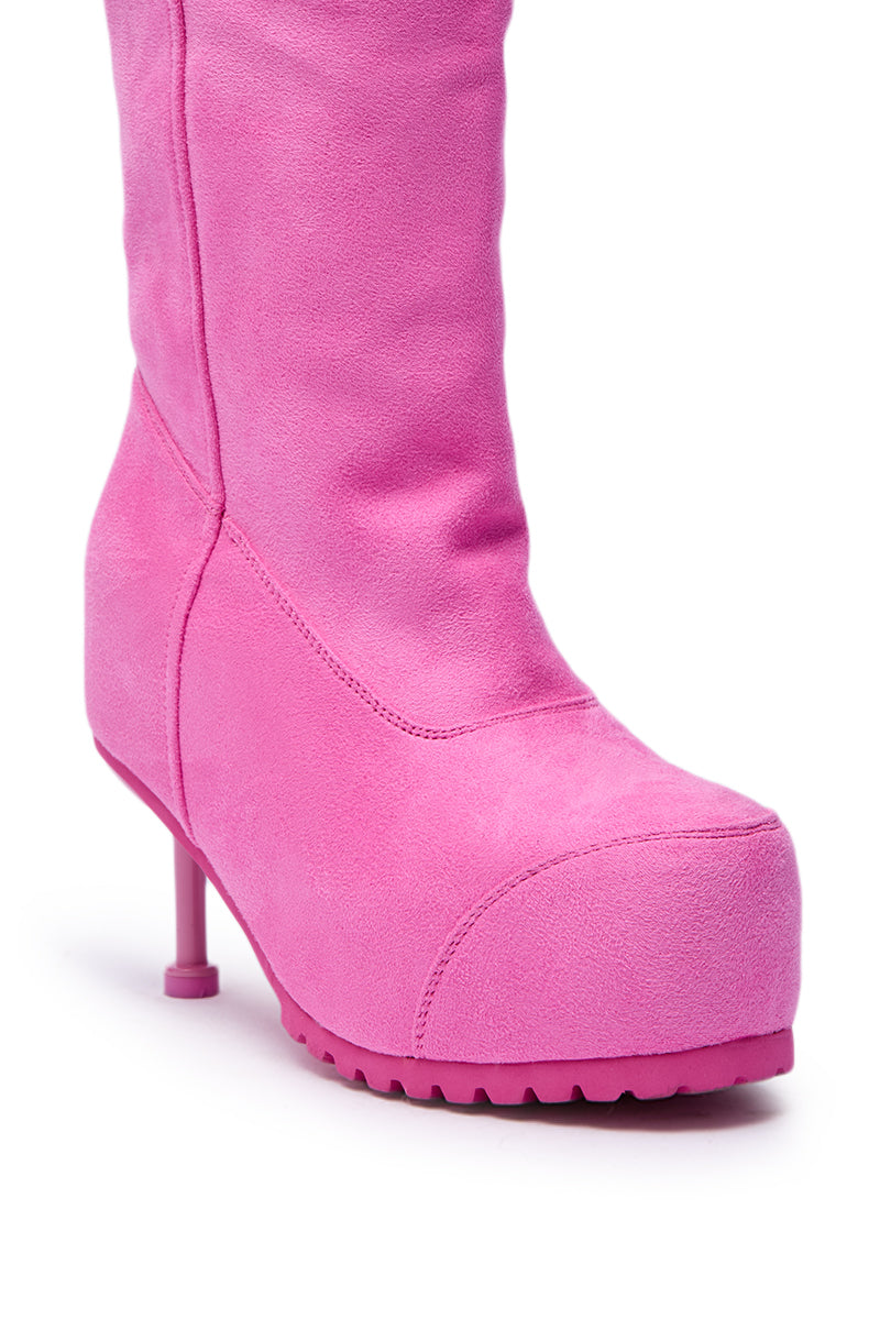 The AZALEA WANG CLEDQYN Pink Suede Stiletto Boot features a vibrant pink knee-high design, a chunky platform sole, and slim high heel, making it pop against a crisp white background. 6