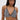 A woman with straight, long hair wears the SHAGGY BRALETTE, a black and white textured halter neck bikini top. She stands against a plain light background, looking directly at the camera with a neutral expression.