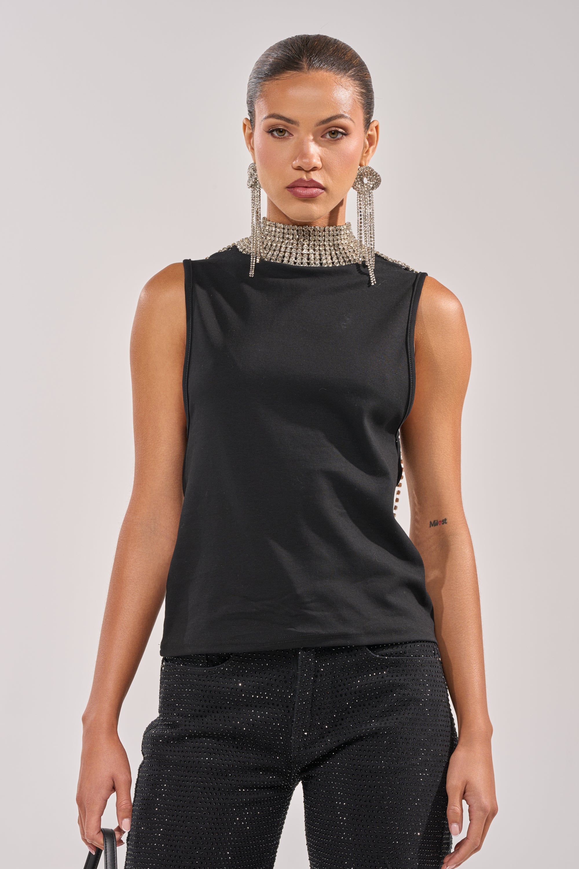 ONE OF ONE RHINESTONE SLEEVELESS TEE IN BLACK – AKIRA