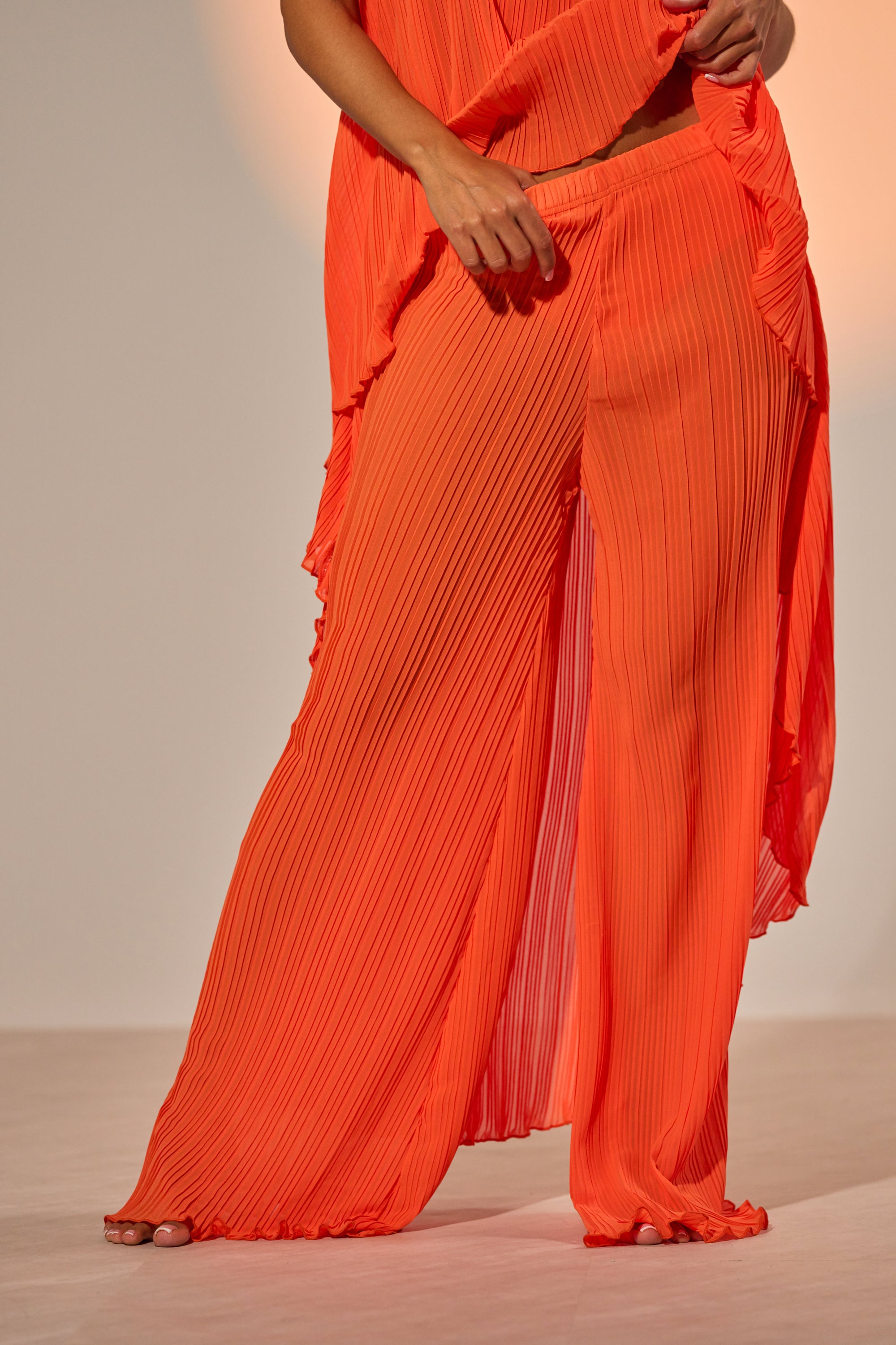 Step up your vacation style with the vibrant CRUSHIN ON YOU PALAZZO PANT, shown here with a matching top and barefoot on a light floor—ideal for carefree, sunny getaways. 0