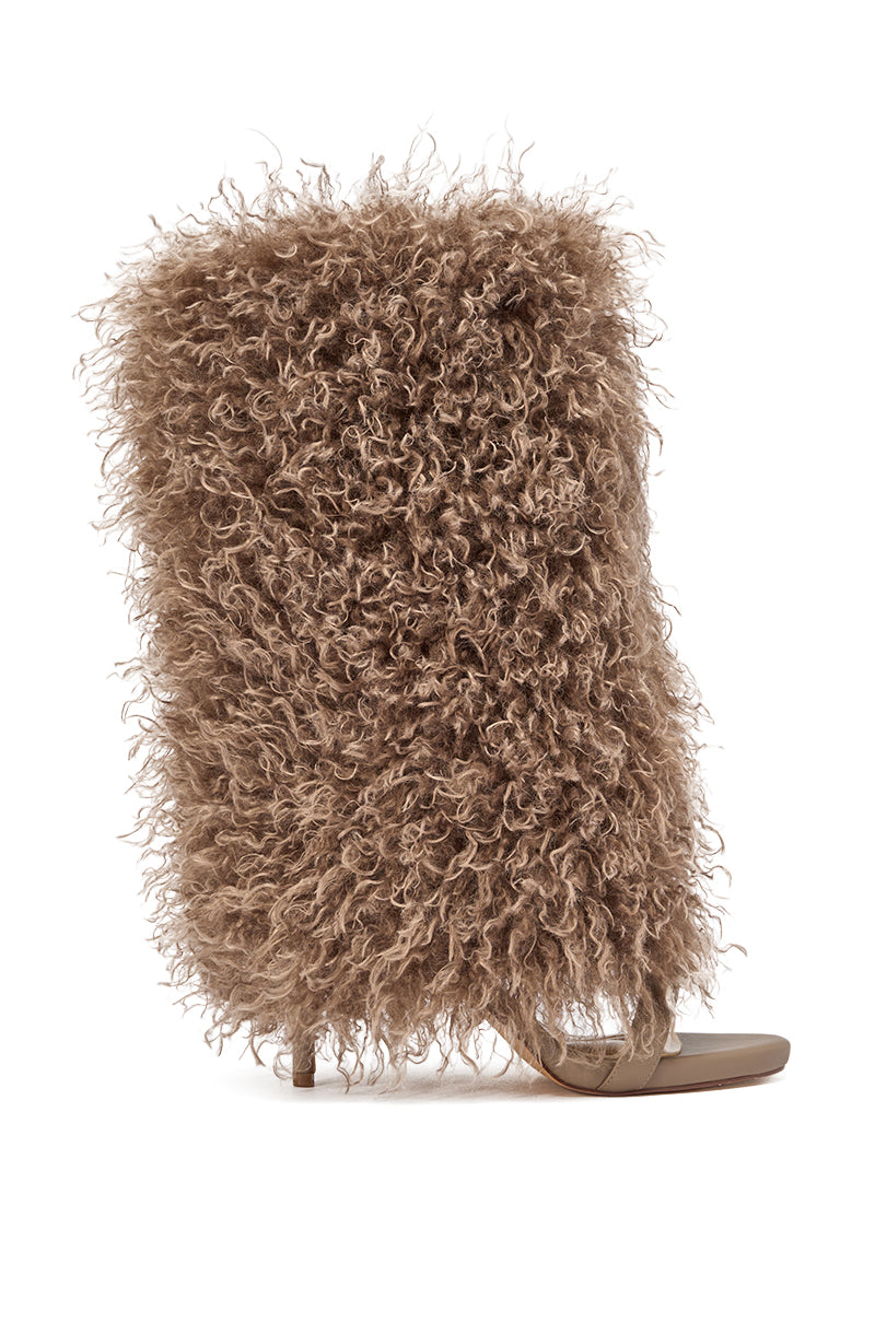The Azalea Wang CLOUD NINE Taupe Fur Open Toe Boot features a dramatic shaggy faux fur covering in light taupe, with a stiletto heel and sole peeking through for a chic, textured statement look. 2