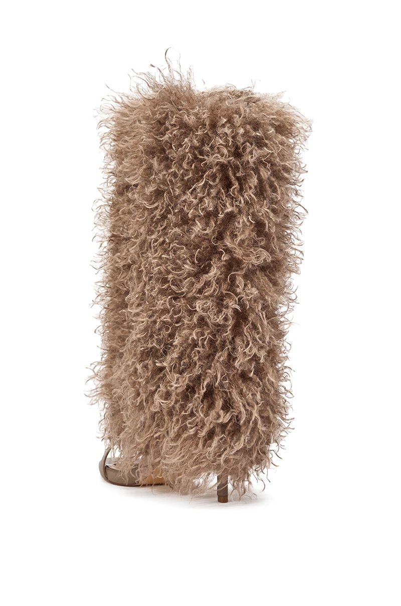 The Azalea Wang CLOUD NINE TAUPE FUR OPEN TOE BOOT features shaggy taupe faux fur throughout, styled on a stiletto heel and photographed against a white background—an eye-catching statement shoe for bold fashion lovers. 4