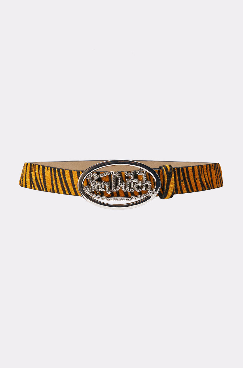 The VON DUTCH TIGER BELT features Y2K-inspired yellow and black faux fur with a large oval buckle displaying the shiny silver Von Dutch logo. 1