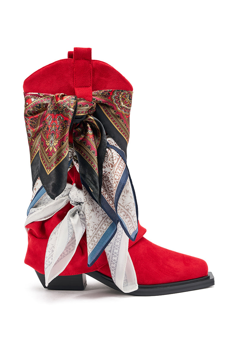 The AZALEA WANG COBALT RED FAUX SUEDE SCARF EMBELLISHED WESTERN BOOTIE features a bright red mid-calf design, low black heel, and two vibrant patterned silk scarves tied in large bows around the shaft for standout style. 4