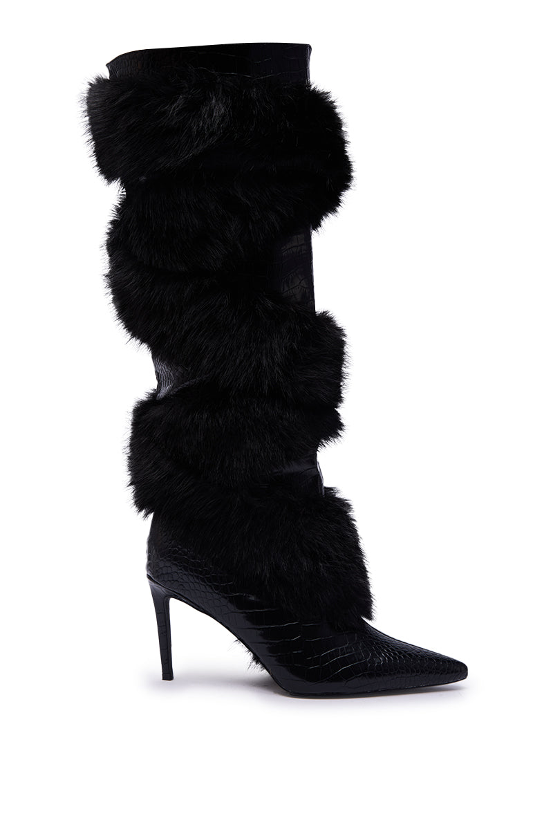 The AZALEA WANG CONRADDE Black Mixed Material Fur and Snake Stiletto Boot is knee-high with a pointed toe, crocodile-like faux leather, and bold black fur bands around the shaft.