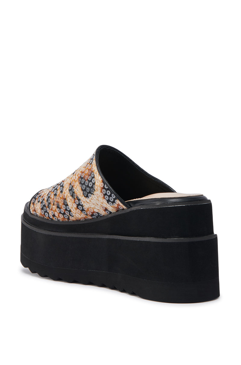 The AZALEA WANG CORLISS LEOPARD FLATFORM SANDAL showcases a bold leopard print upper, thick black flatform sole, open-back design, and a cushioned faux leather insole for comfort and standout style all day.