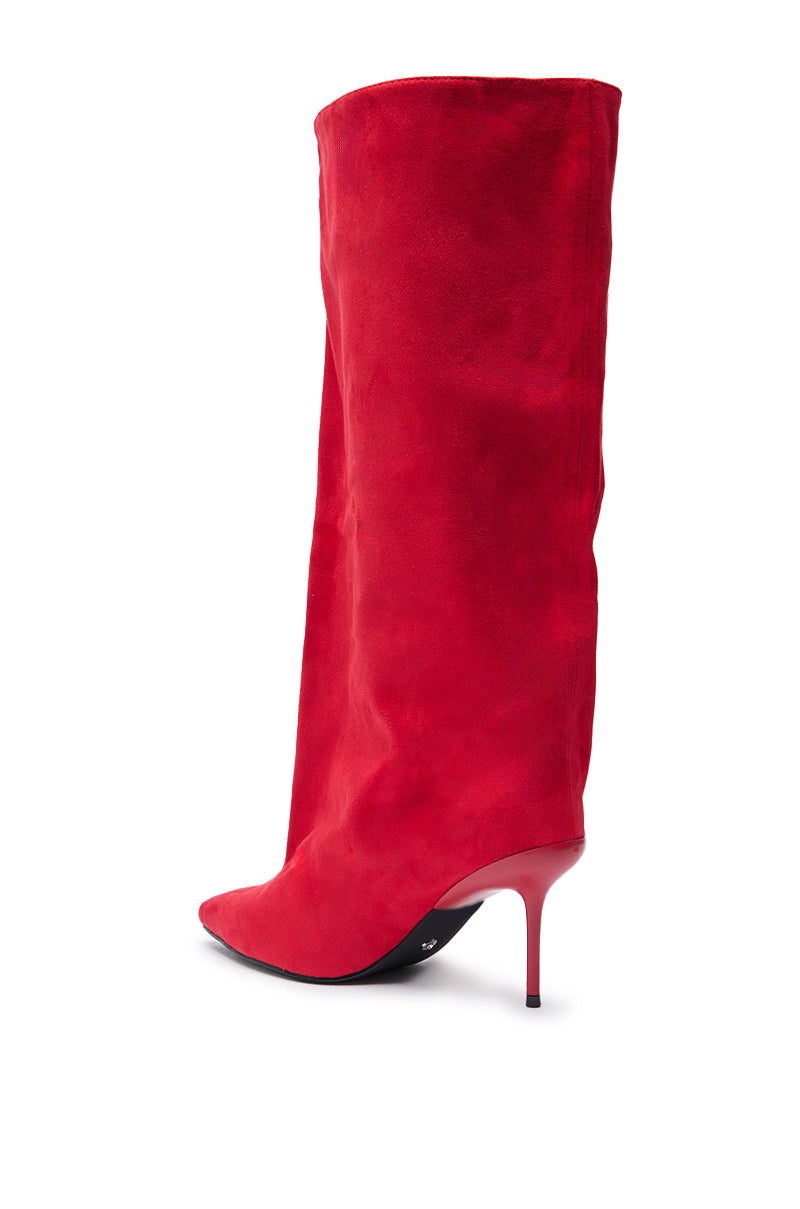 The AZALEA WANG COUTURE LURE RED FAUX SUEDE BOOT is a tall, knee-high boot in bright red with a pointed toe and slim high stiletto heel, shown from the side and back. 3