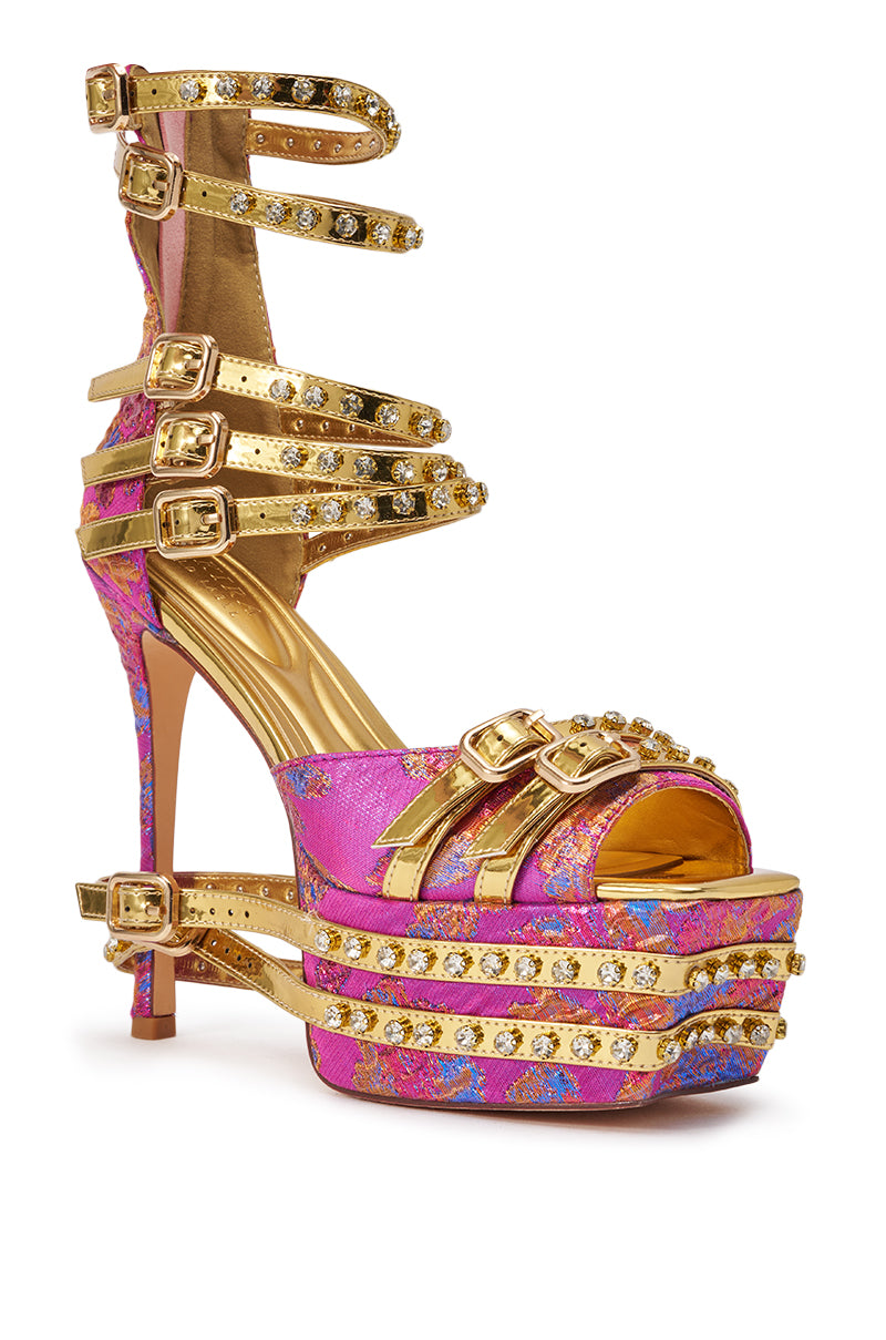 The AKIRA CRUSHIN PINK MULTI BROCADE AND GOLD EMBELLISHED STILETTO SANDAL features a pink brocade design with gold floral pattern, jeweled gold buckle straps, and a metallic gold insole—ideal statement heels for brunch. 3