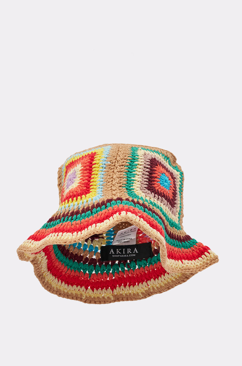 The NEUTRAL VIBES CROCHET BUCKET HAT features a colorful crochet granny-square pattern in red, green, yellow, beige, and blue, shown upside down to display the inner "AKIRA" label. 3