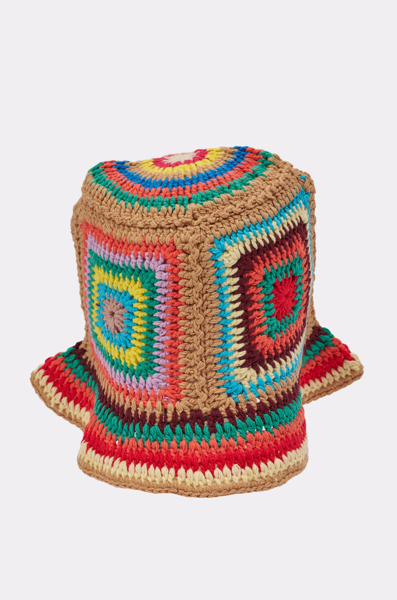 The NEUTRAL VIBES CROCHET BUCKET HAT features colorful granny-square patterns in red, blue, yellow, green, and tan yarns with a flared brim and geometric patchwork design—ideal for adding playful style to your beach look. 4