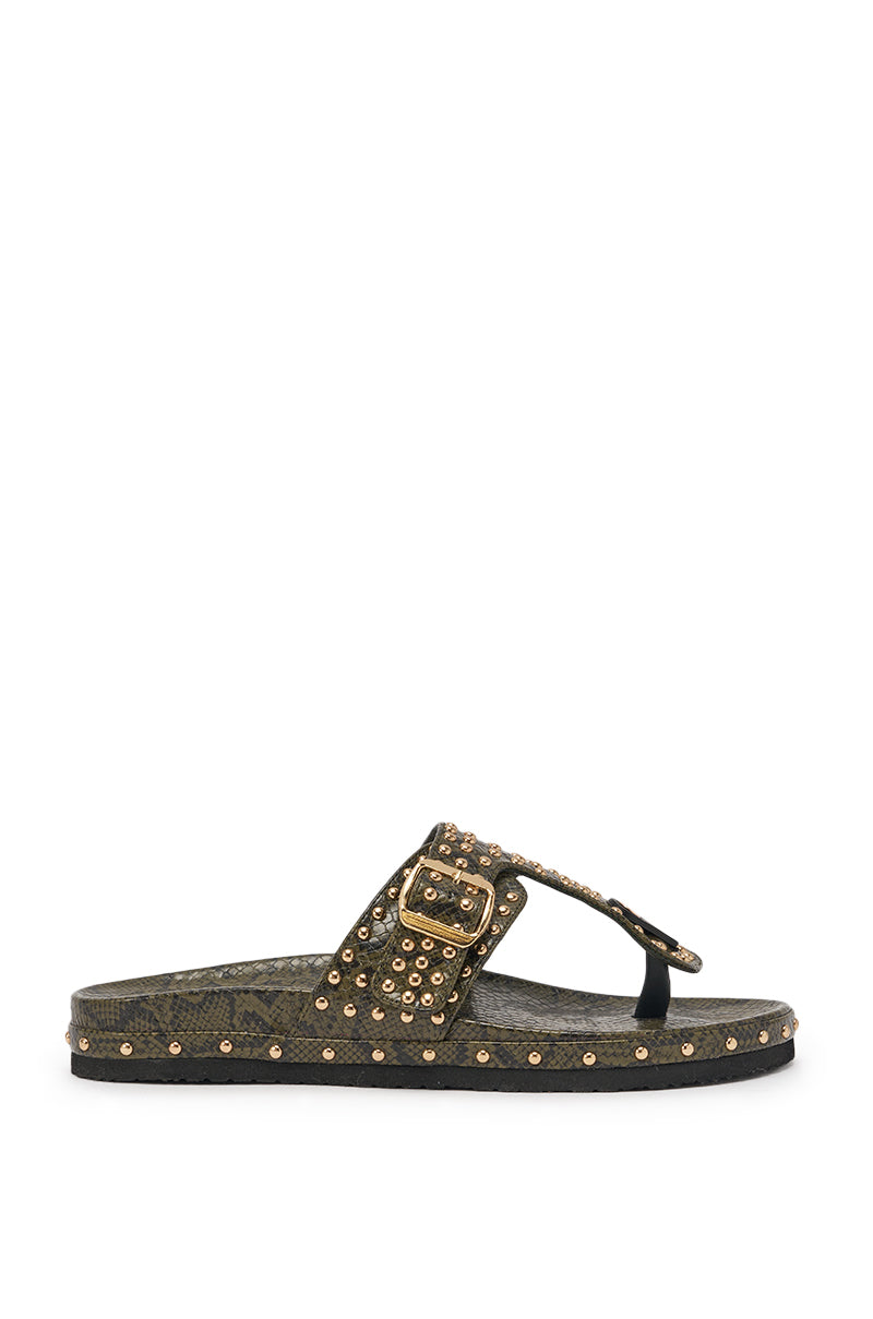 The AZALEA WANG DAISY CHAIN GREEN SNAKE STUDDED FLAT SANDAL features a dark green textured sole, faux snakeskin leather, gold studs, a gold buckle, toe loop, and decorative rivets along the strap and sole for standout flair. 5