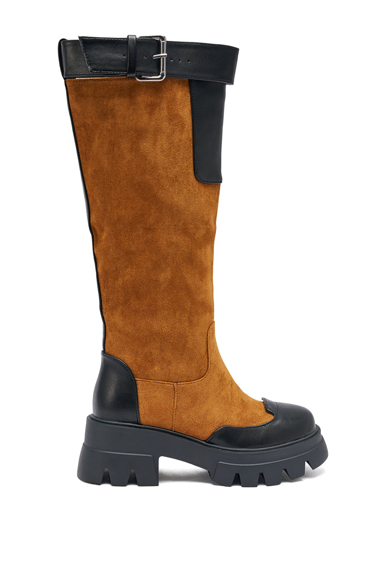 The AZALEA WANG DALILA Color Blocked Flatform Boot in cognac features knee-high brown faux suede, a chunky black sole, black leather accents on the toe, heel, and top edge, plus a striking decorative calf buckle strap. 3
