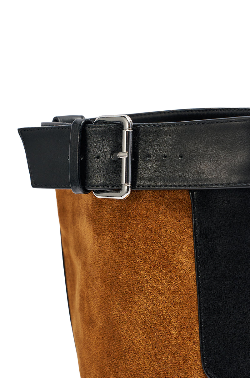Close-up of the AZALEA WANG DALILA COLOR BLOCKED FLATFORM BOOT IN COGNAC, showcasing a black leather belt with a silver buckle fastened around brown faux suede and black leather accents. 6