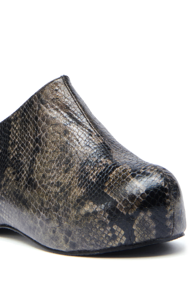 A close-up of the AZALEA WANG DARWIN CLOG IN BLACK SNAKE, a slip-on with shiny black and brown faux leather snakeskin texture and a rounded toe.