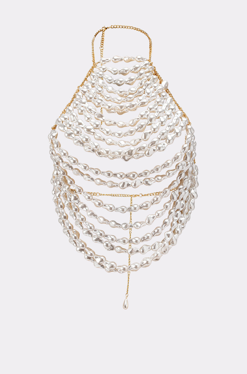 The SHELL YEAH BODY CHAIN is a layered necklace with multiple strands of irregular white pearls linked by gold chains, finished with a single pearl drop—ideal as statement jewelry or chic bridal accessories. 2