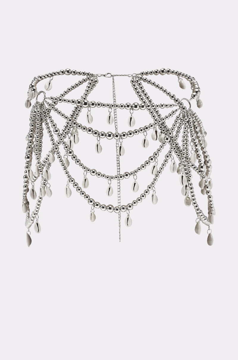 The TOO CHIC SEASHELL BELT is a silver beaded body chain with draping strands and shell-like charms, perfect as boho beach jewelry or a festival waist belt to add flair to your upper body style. 1