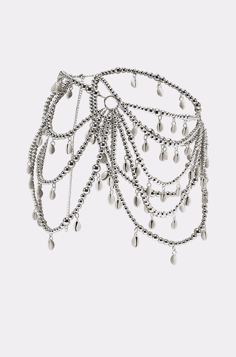 The TOO CHIC SEASHELL BELT is a decorative silver waist chain belt with layered draping chains and dangling oval charms in an intricate, web-like pattern—ideal as a festival or beach bohemian accessory. 2