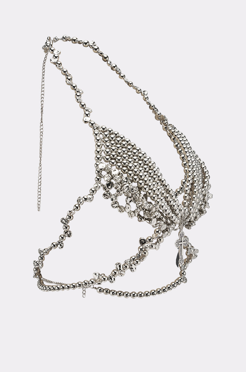 The KEKE BODY CHAIN is a silver beaded bralette with intricate chains and metal beads, featuring an openwork design and delicate dangling accents—a bold statement jewelry piece ideal for festivals. 3